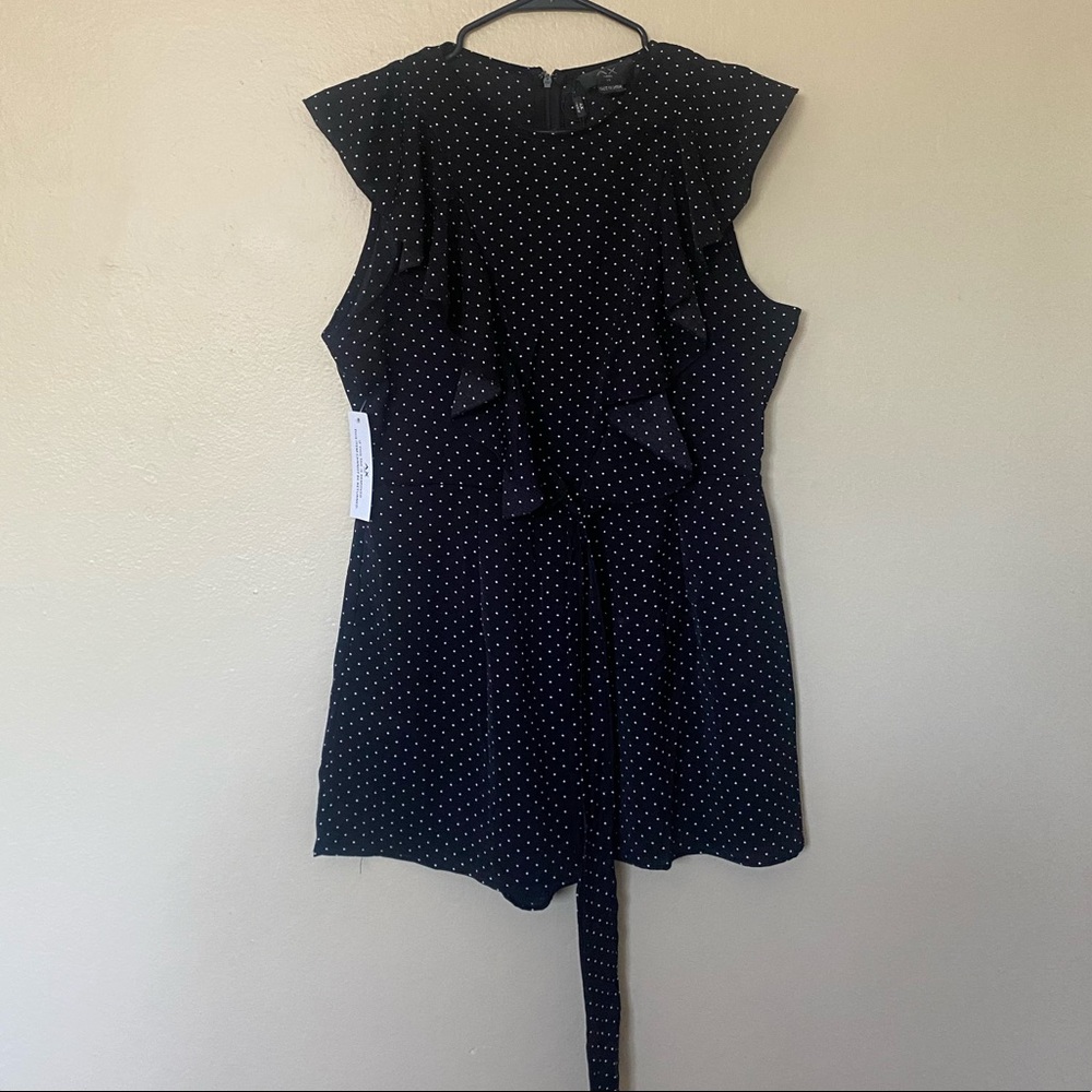 Black polka dot romper size 10